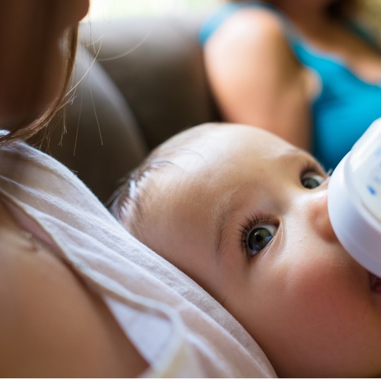 introducing a bottle of expressed milk